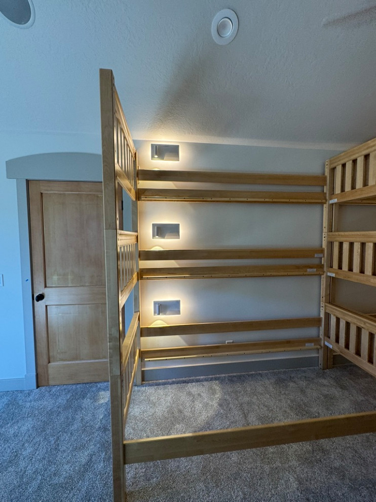 Upper level loft bunk room, phone chargers with lights, ceiling fans,