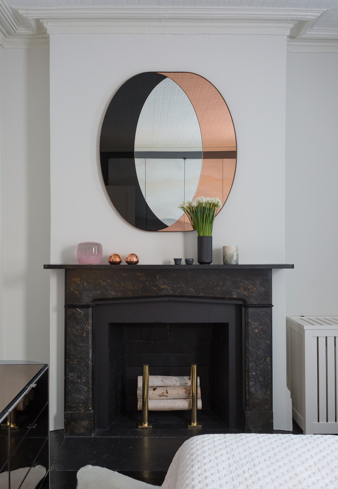 West Village Pied-A-Terre - Notable decor elements include: Bower Ring mirror,
High Style Deco andirons,
Photography: Francesco Bertocci