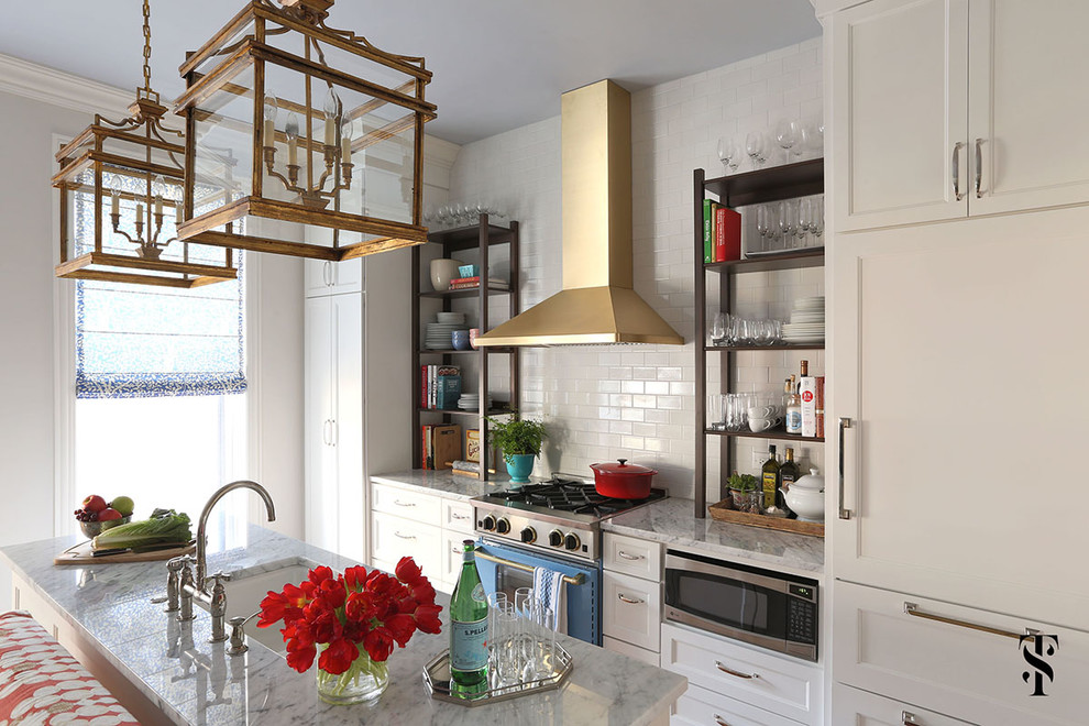 Transitional single-wall medium tone wood floor eat-in kitchen photo with an undermount sink, recessed-panel cabinets, white cabinets, marble countertops, white backsplash, subway tile backsplash, colored appliances and an island