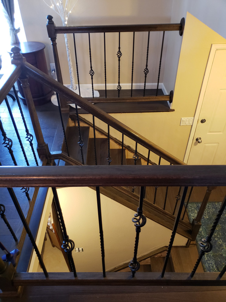 Classic Iron Balusters & Dark Wood Staircase Transformation