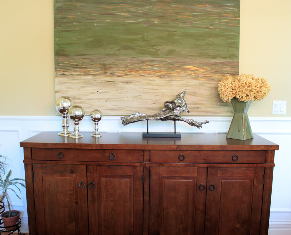 Large transitional dark wood floor enclosed dining room photo in Chicago with yellow walls