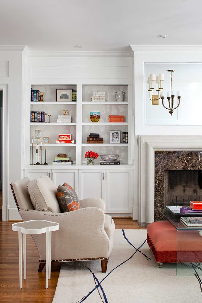 Inspiration for a transitional family room in Atlanta with white walls.
