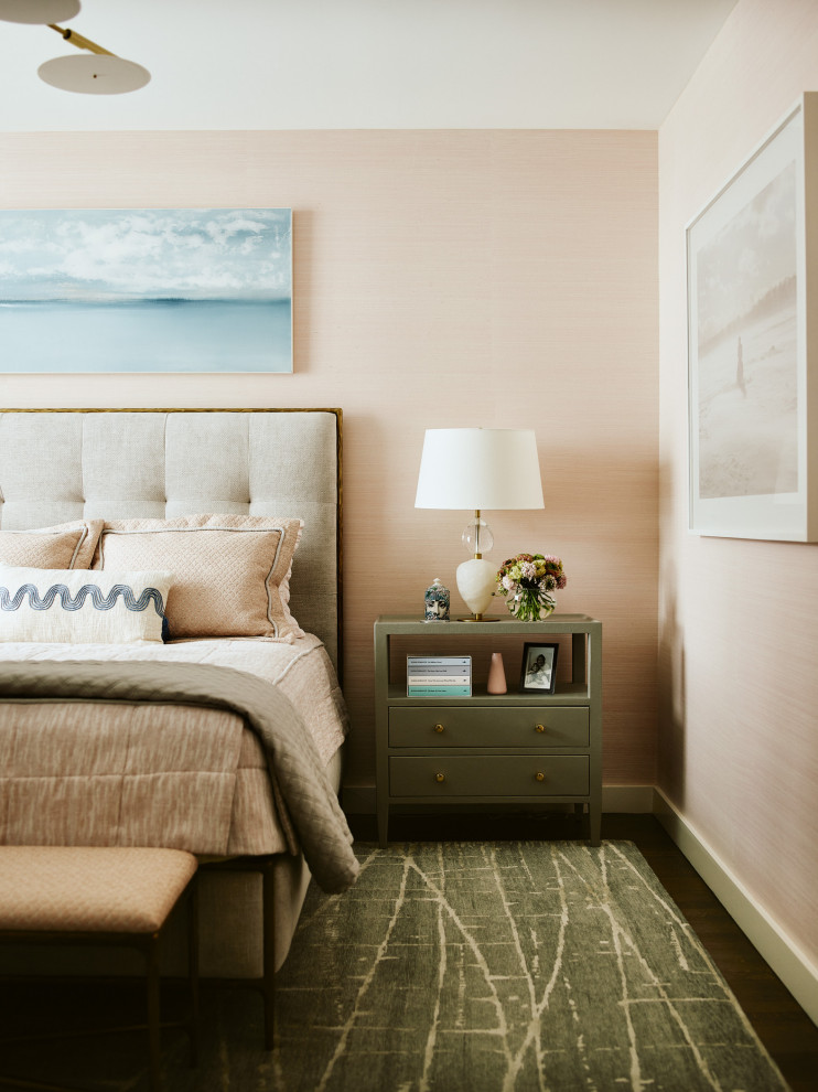 Design ideas for a large transitional master bedroom in Boston with pink walls, dark hardwood floors, no fireplace, brown floor and wallpaper.
