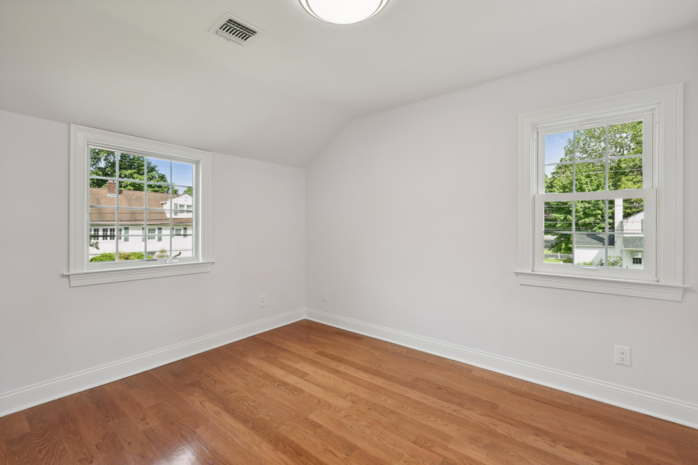 Bedroom with Corner Windows and Vaulted Ceiling