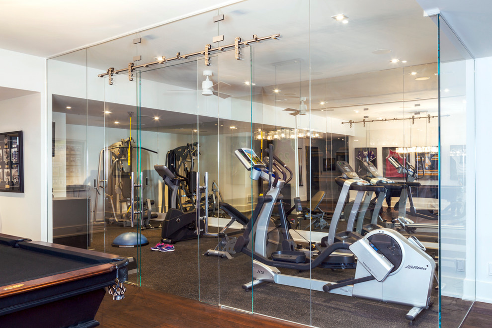 This is an example of a contemporary multipurpose gym in Toronto with white walls.