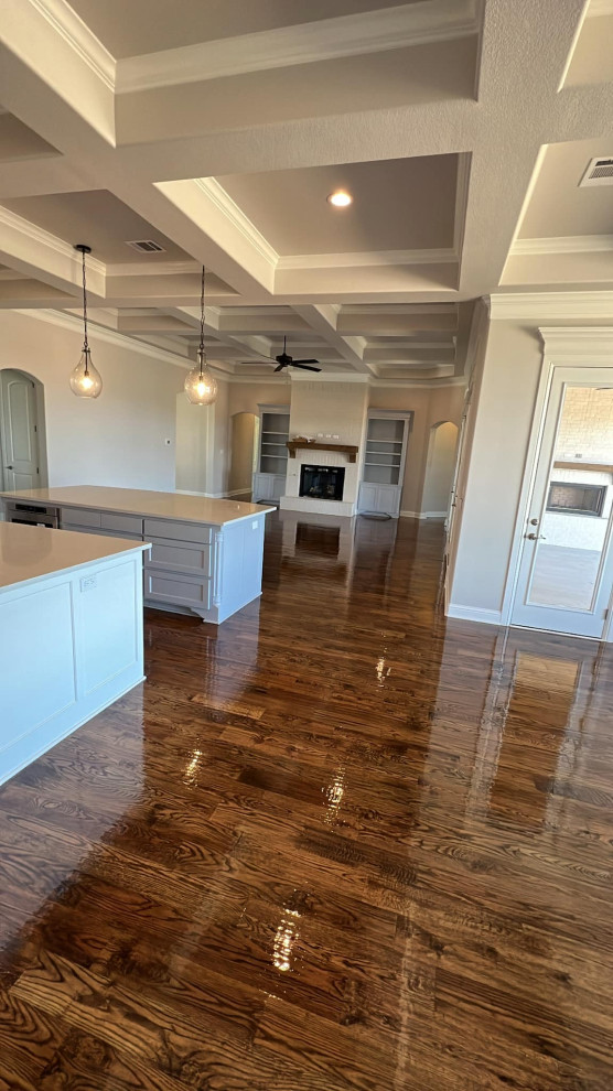 Large 1950s galley light wood floor, brown floor and shiplap ceiling eat-in kitchen photo in Dallas with louvered cabinets, white cabinets, quartzite countertops, an island and white countertops