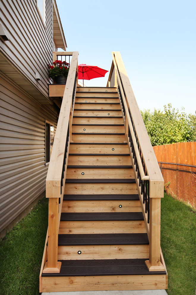 Deck - mid-sized backyard deck idea in Minneapolis