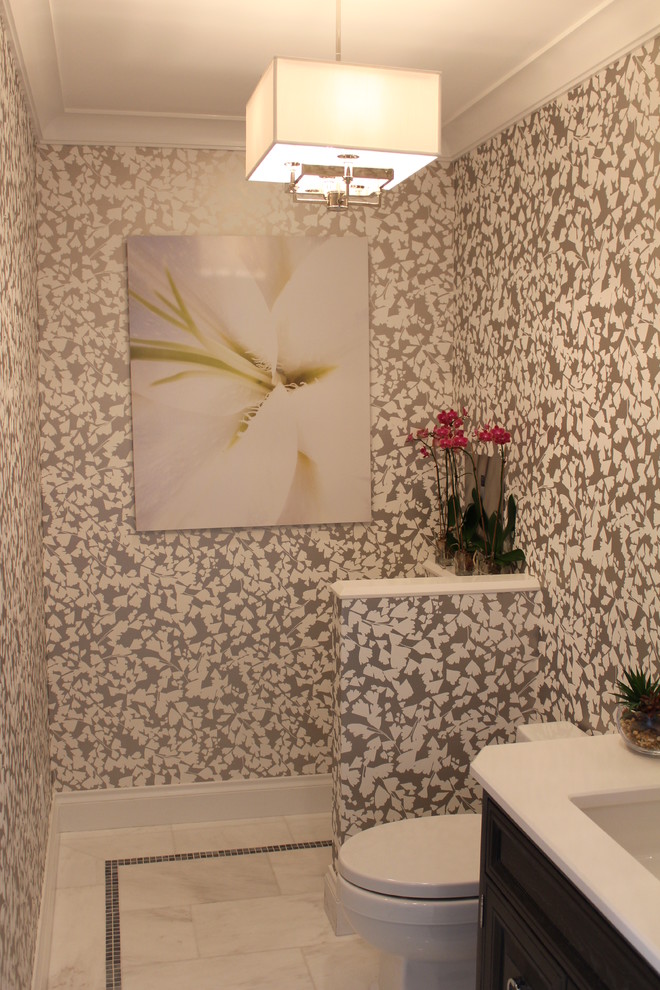 Example of a mid-sized transitional home design design in Miami
