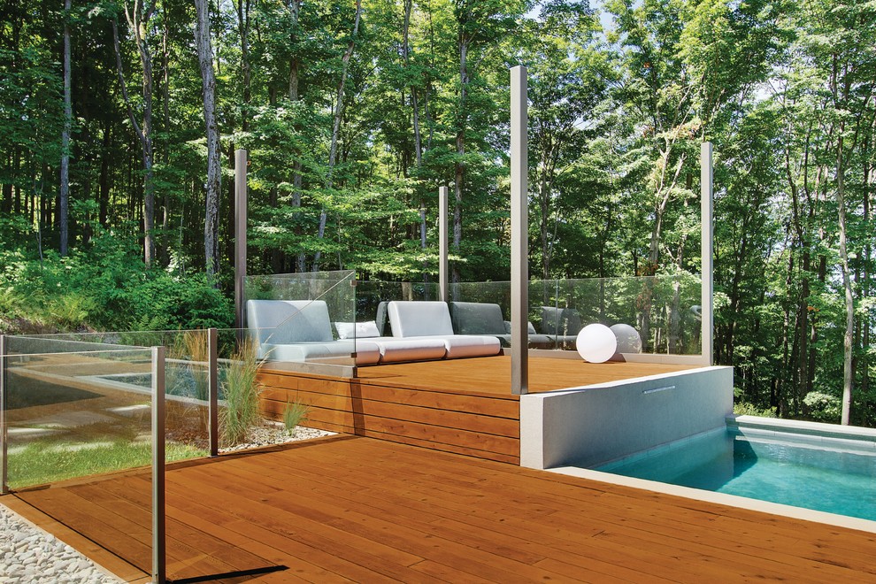 Inspiration for a small modern backyard deck in Other with no cover.