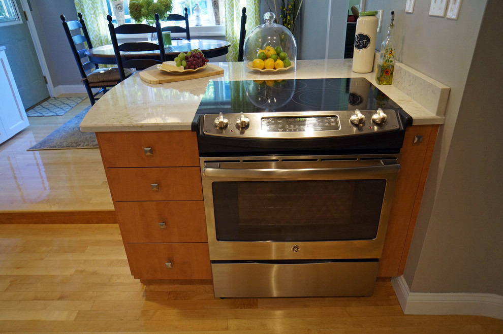 Eat-in kitchen - large transitional l-shaped light wood floor eat-in kitchen idea in Boston with a farmhouse sink, shaker cabinets, white cabinets, quartz countertops, white backsplash, stone slab backsplash, stainless steel appliances and an island