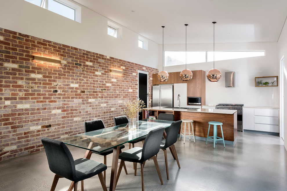 Small contemporary dining room in Perth with white walls and concrete floors.