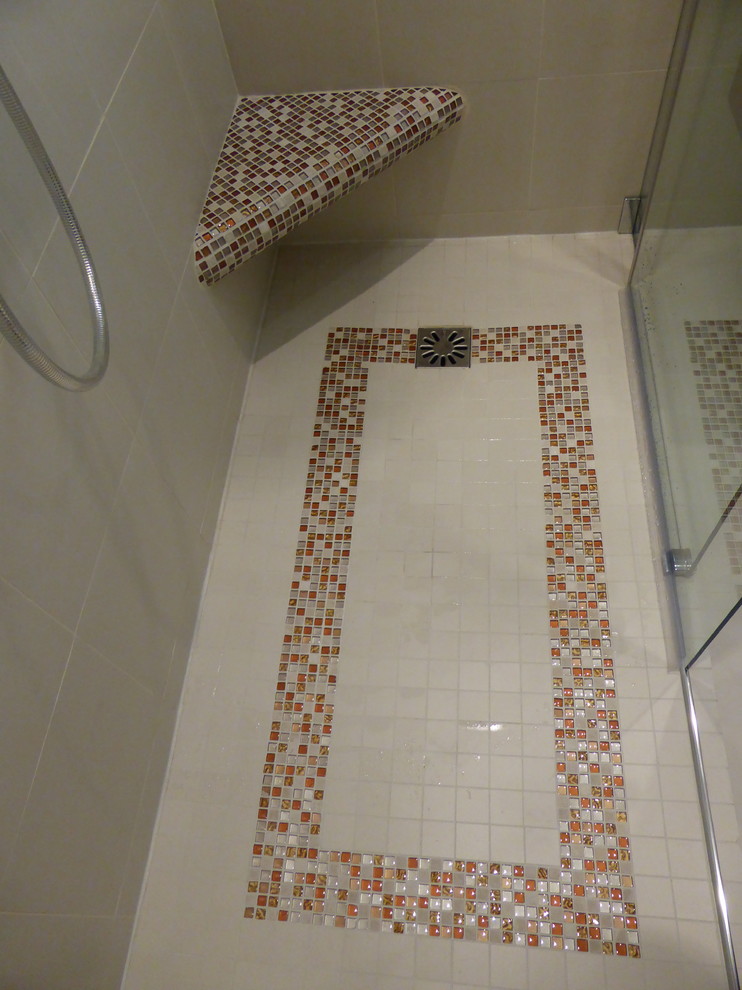This is an example of a small contemporary 3/4 bathroom in Paris with a curbless shower, beige tile, ceramic tile, beige walls, mosaic tile floors, beige floor and a sliding shower screen.