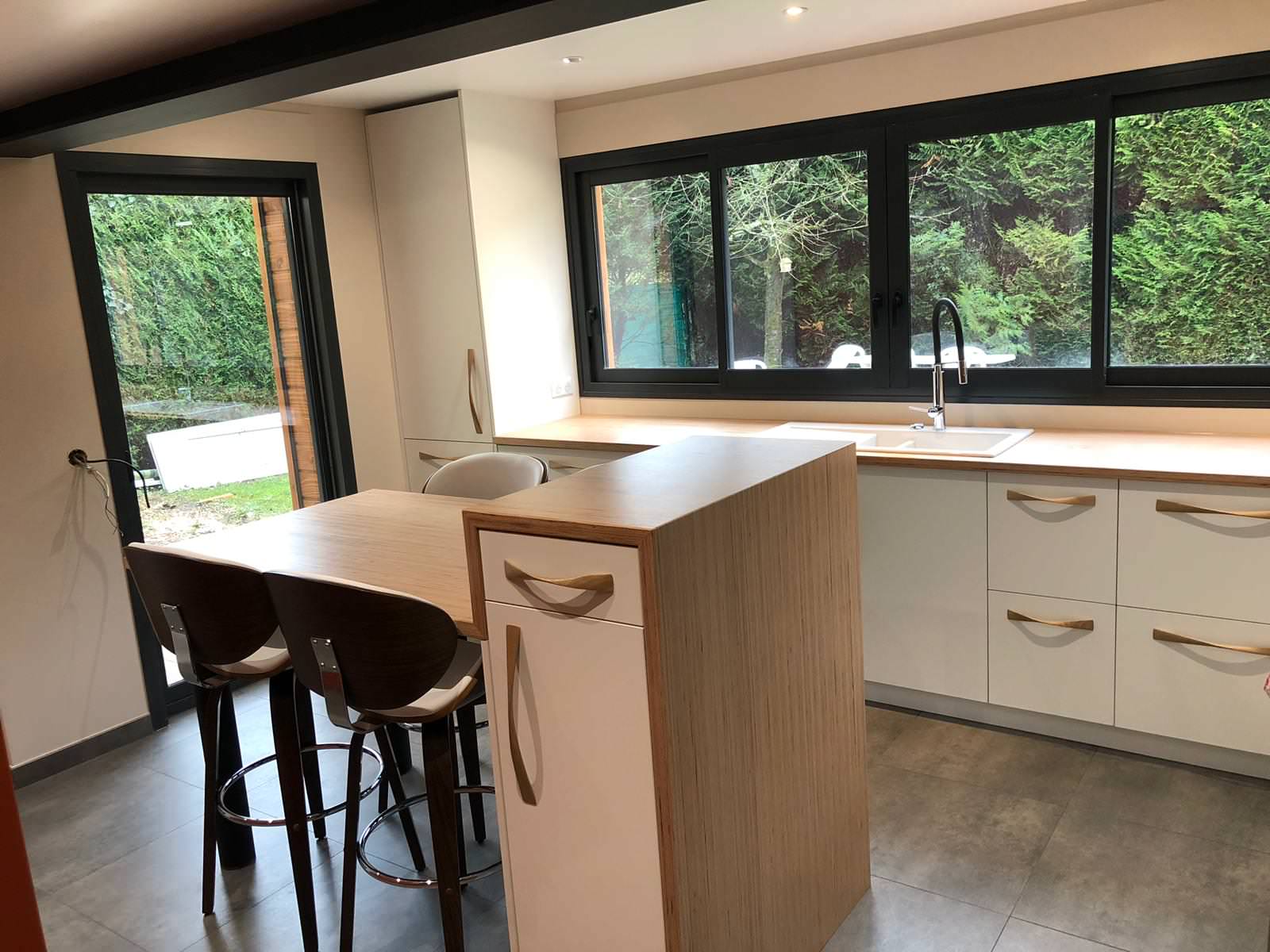 Extension en ossature bois d'une maison individuelle