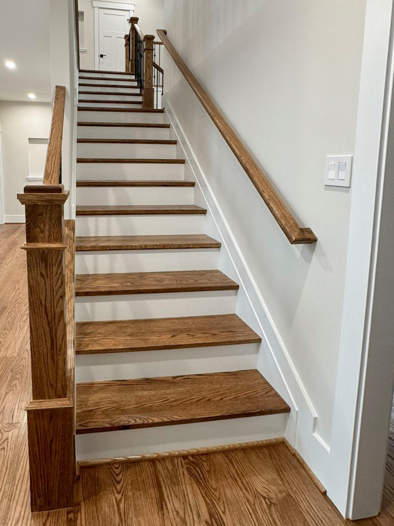 117_Distinct Oak Staircase with Iron Balusters & Oak Rail Profile, Chantilly VA