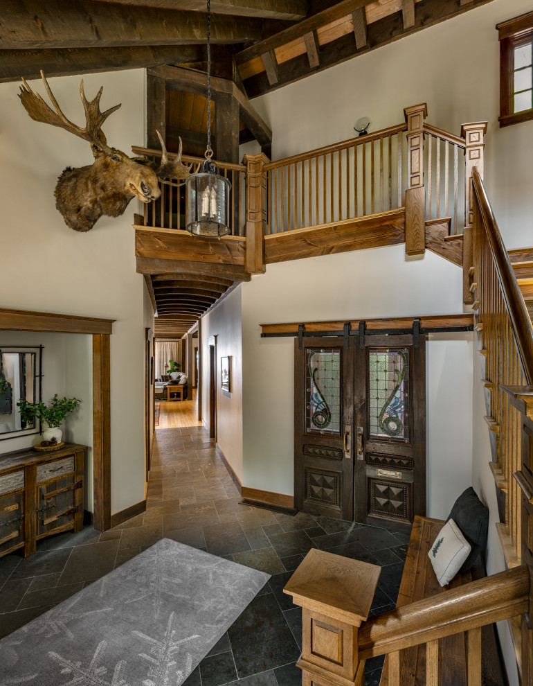 Example of a mountain style home design design in Boston