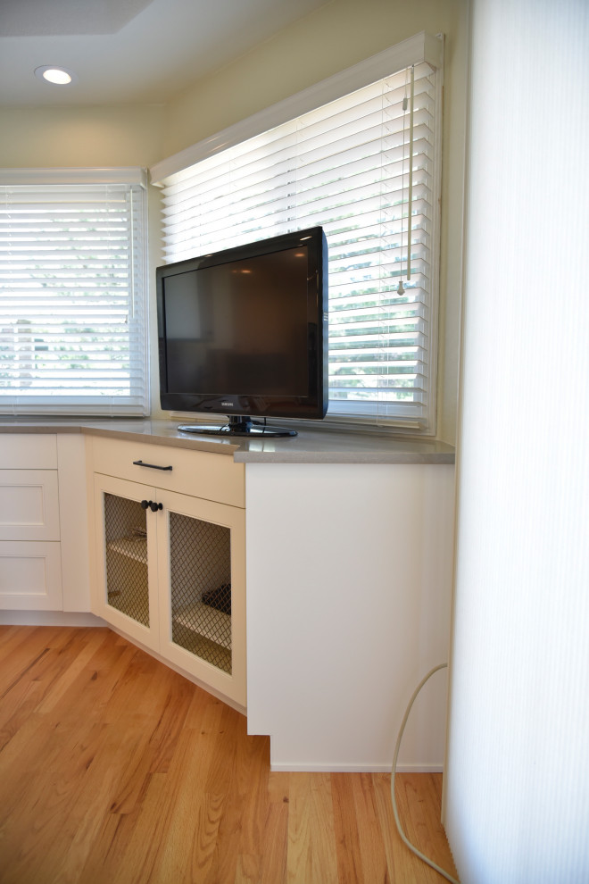 Inspiration for a mid-sized transitional single-wall porcelain tile, beige floor and coffered ceiling eat-in kitchen remodel in Denver with an undermount sink, shaker cabinets, white cabinets, quartz countertops, beige backsplash, ceramic backsplash, stainless steel appliances, an island and beige countertops