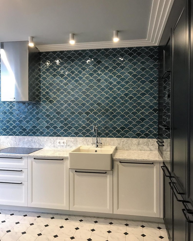 Photo of a mid-sized scandinavian single-wall separate kitchen in Yekaterinburg with a drop-in sink, recessed-panel cabinets, white cabinets, solid surface benchtops, blue splashback, mosaic tile splashback, black appliances, ceramic floors, no island, multi-coloured floor and grey benchtop.