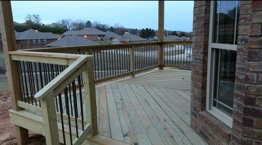 Photo of a mid-sized traditional backyard deck in Other.