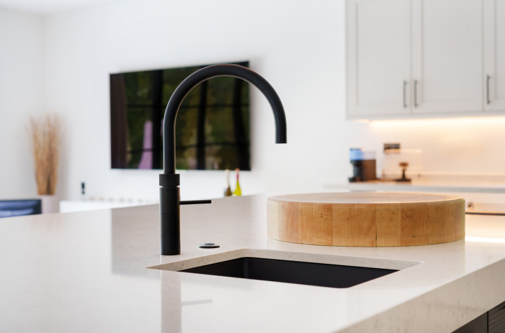 This is an example of a traditional kitchen in Surrey.