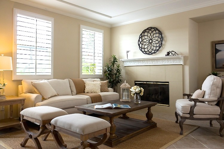 Photo of a mid-sized traditional open concept family room in San Diego with white walls, ceramic floors, a standard fireplace, a tile fireplace surround, a home bar and a freestanding tv.