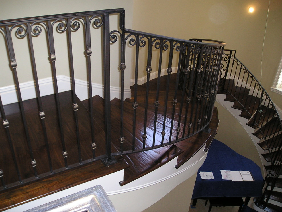 Inspiration for a mid-sized transitional wooden straight staircase remodel in Miami with wooden risers