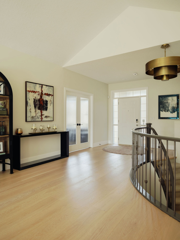 Example of a transitional home design design in Edmonton