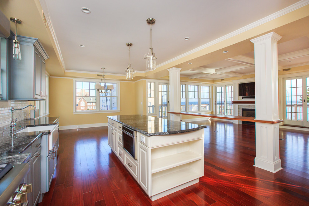 Inspiration for a large beach style kitchen in Philadelphia with medium hardwood floors.
