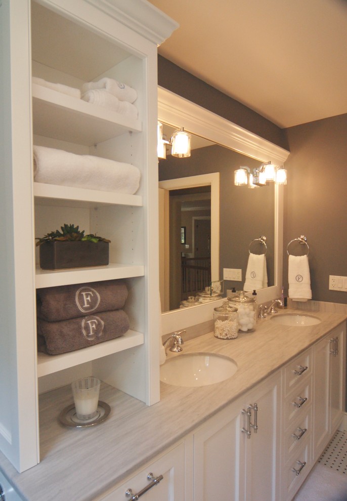 Walk-in shower - mid-sized traditional kids' black and white tile and ceramic tile ceramic tile walk-in shower idea in New York with beaded inset cabinets, white cabinets, a one-piece toilet, gray walls, an undermount sink and marble countertops