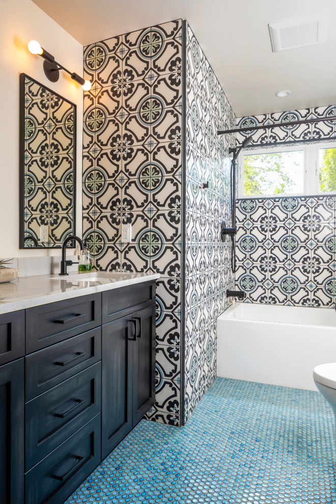 Bathroom - mid-sized contemporary multicolored tile and cement tile porcelain tile, blue floor and single-sink bathroom idea in Seattle with shaker cabinets, black cabinets, a one-piece toilet, white walls, an undermount sink, quartzite countertops, white countertops and a built-in vanity