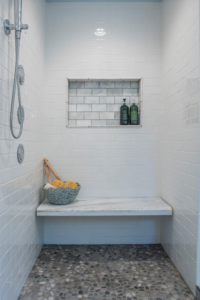 Photo of a transitional bathroom in Other with an open shower, subway tile and white walls.