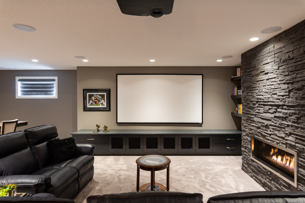 This is an example of a large contemporary home cinema in Calgary with grey walls, carpet and beige floors.