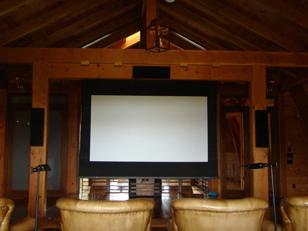 Home theater - large transitional open concept medium tone wood floor home theater idea in Burlington with a projector screen and brown walls