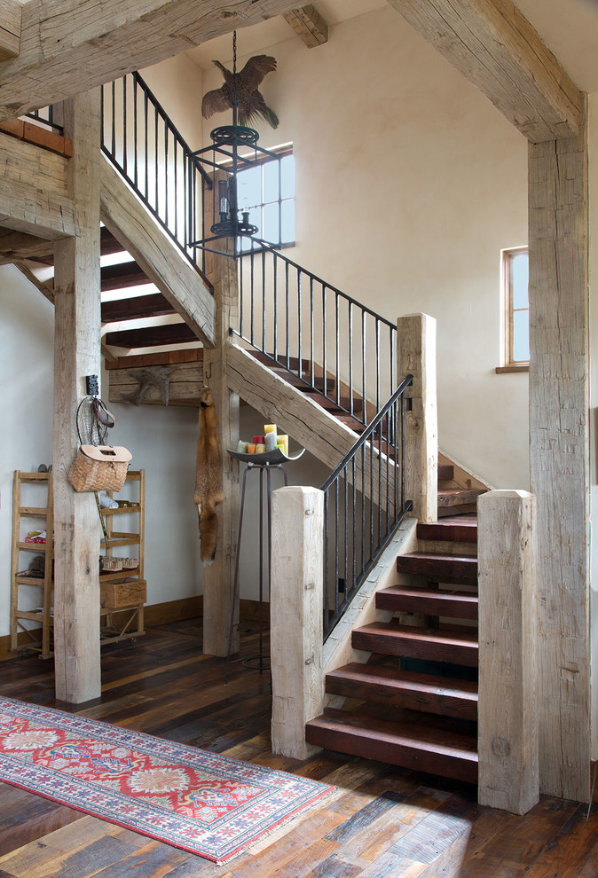 Mountain style staircase photo in Denver
