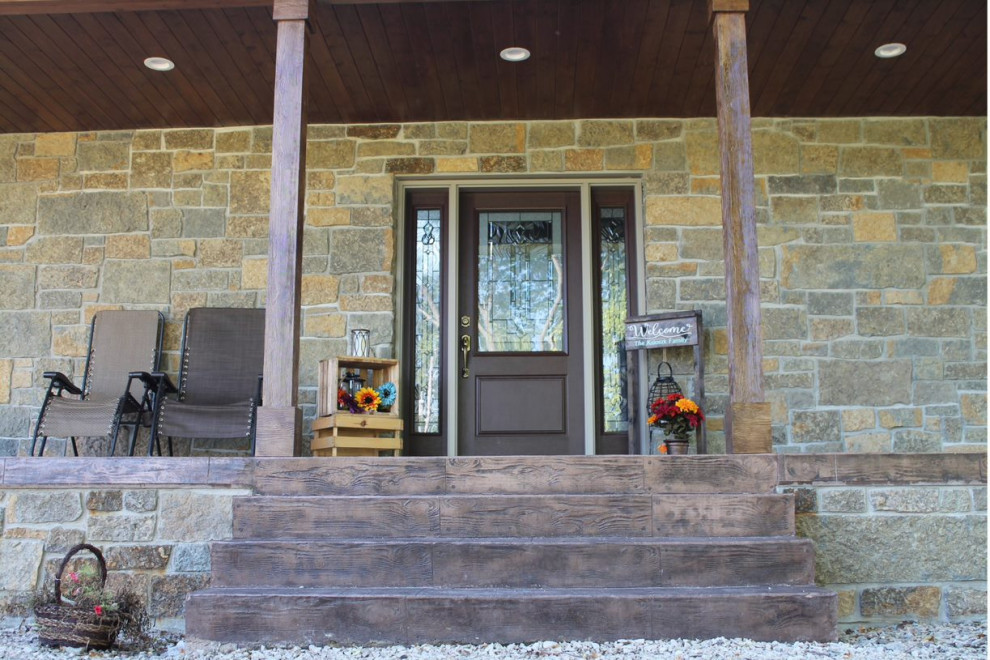 Inspiration for a timeless front porch remodel in Other with decking and a roof extension