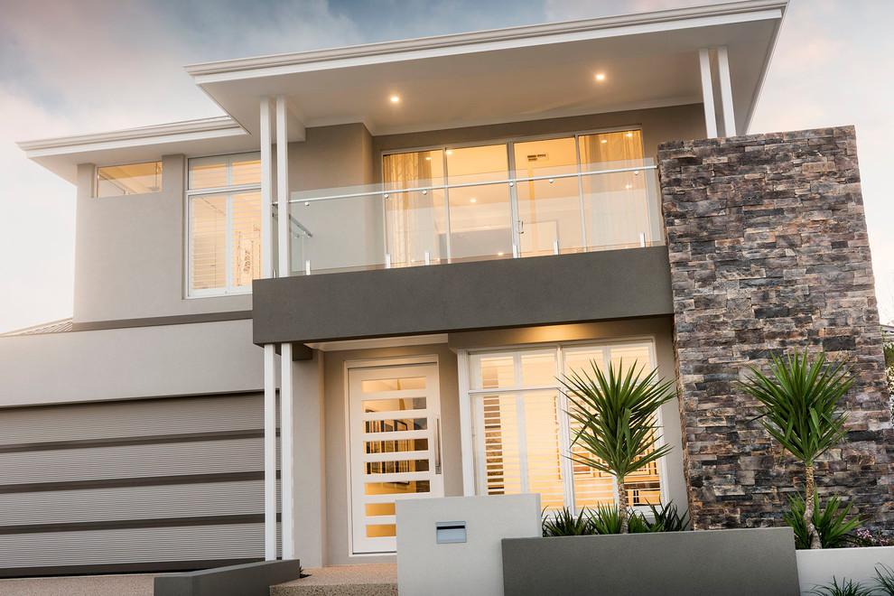 Inspiration for a large contemporary two-storey grey exterior in Perth with stone veneer.