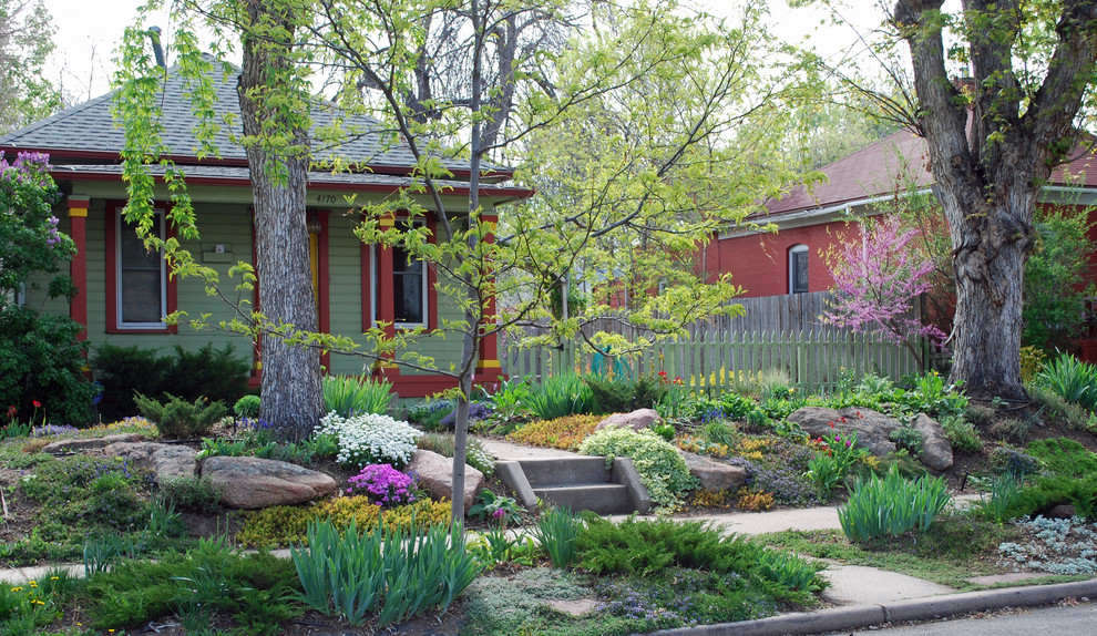 Eclectic front yard garden in Denver.