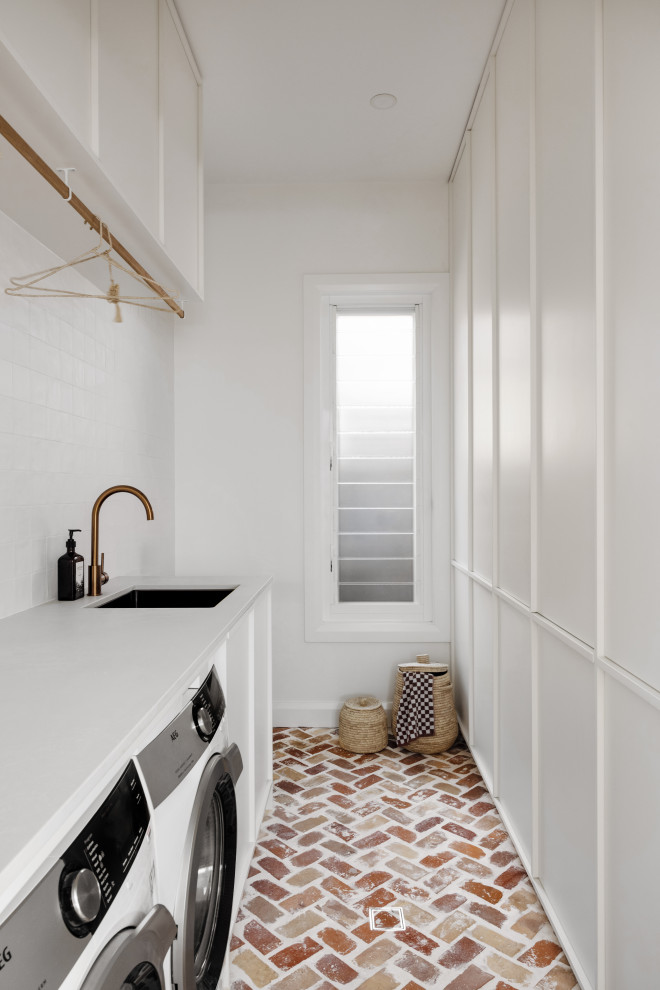 Inspiration for a beach style laundry room in Newcastle - Maitland.
