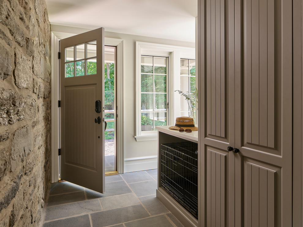 Inspiration for a small mudroom in Philadelphia with beige walls, slate floors, a single front door and grey floor.