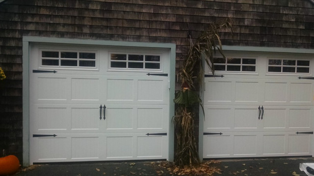 White Carriage House Garage Doors traditional-car-porch