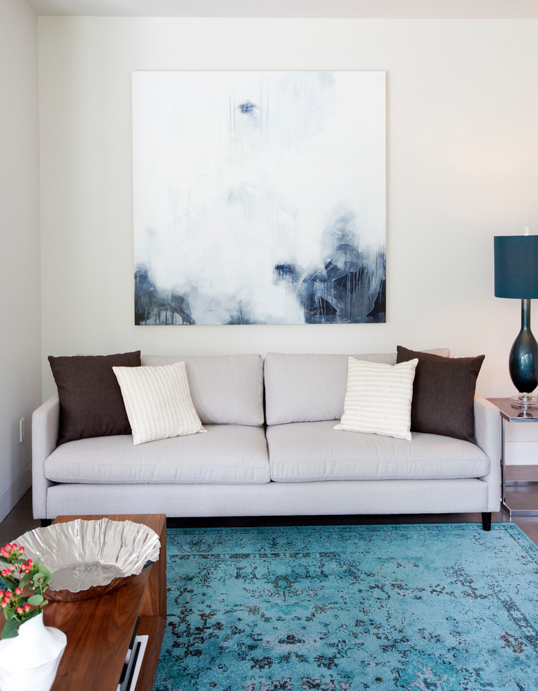 Inspiration for a contemporary living room in Vancouver with white walls.
