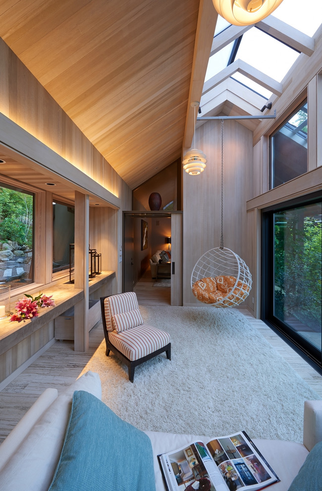 Photo of a contemporary sunroom in Portland with a skylight.