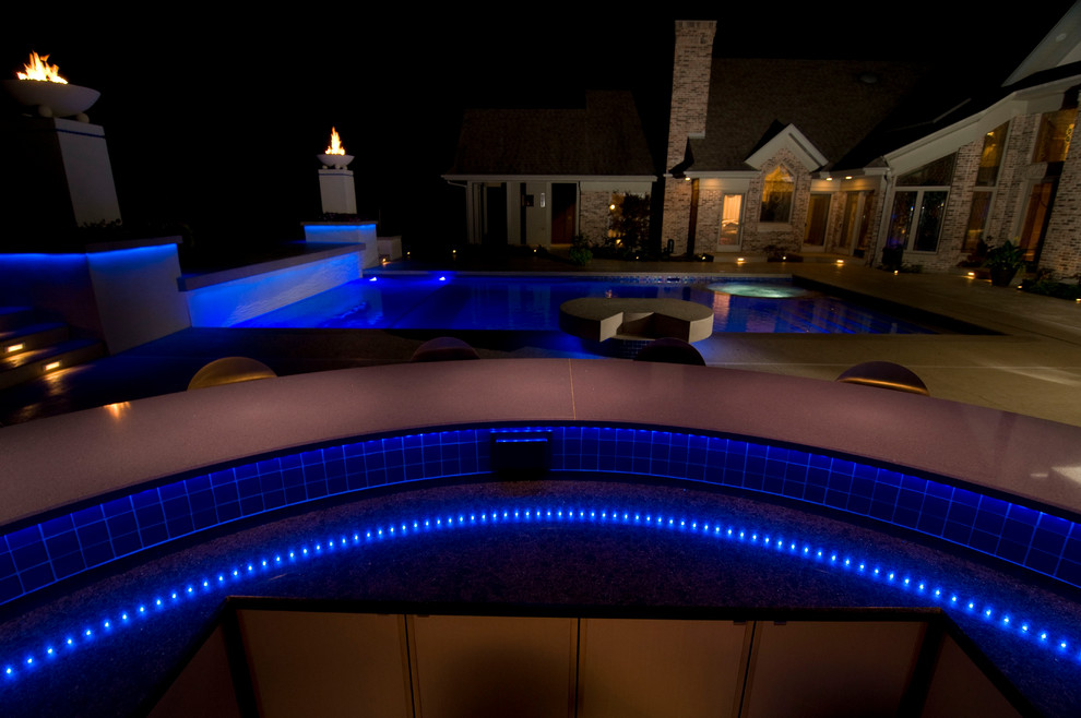 Hot tub - large transitional backyard concrete paver and rectangular natural hot tub idea in Cedar Rapids