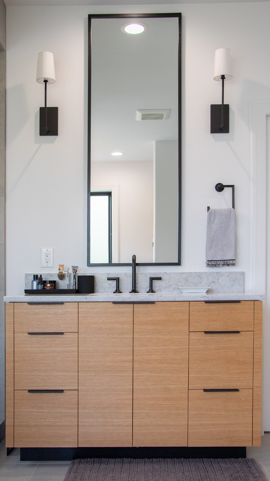 Transitional master bathroom in Portland with an alcove shower, a hinged shower door, flat-panel cabinets, light wood cabinets, a freestanding tub, white walls, ceramic floors, an undermount sink, quartzite benchtops, grey floor and white benchtops.