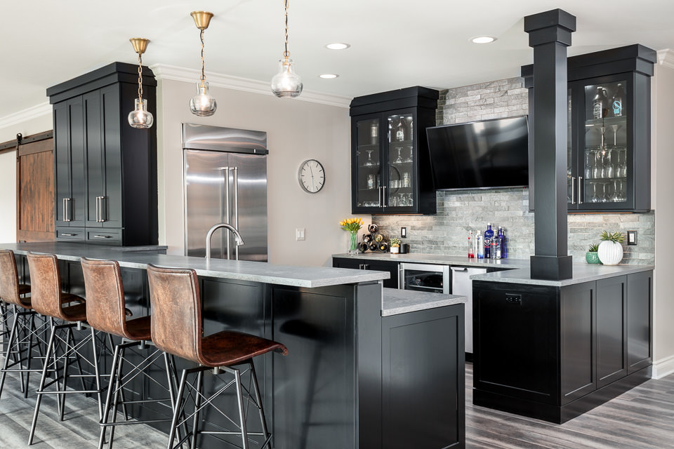 The perfect space for entertaining includes large countertop space for serving as well as hidden appliances for prep work: ice maker, wine fridge, large recessed standing refrigerator, sink and dishwa