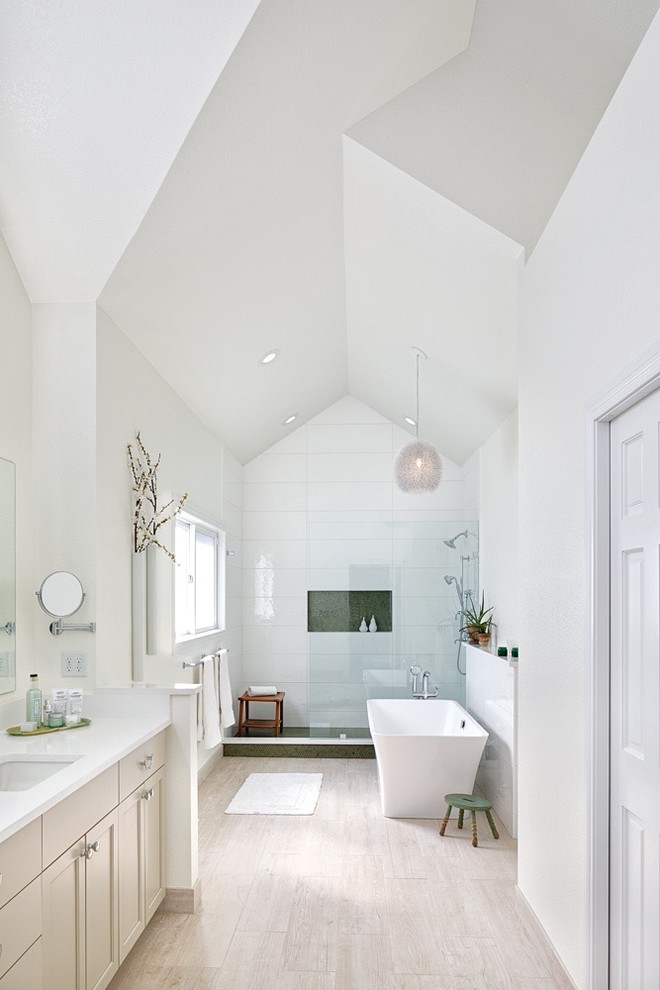 Design ideas for a large transitional master bathroom in Denver with recessed-panel cabinets, beige cabinets, a freestanding tub, an open shower, a two-piece toilet, multi-coloured tile, porcelain tile, white walls, porcelain floors, an undermount sink, engineered quartz benchtops, beige floor, an open shower and white benchtops.