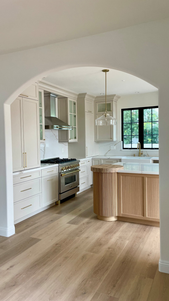 Kitchen - transitional kitchen idea in Los Angeles with quartz countertops, white backsplash, quartz backsplash and white countertops