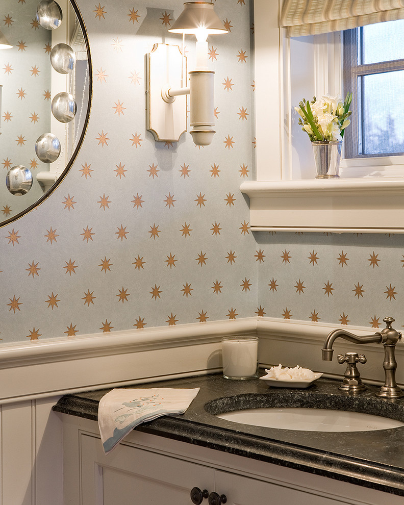 This is an example of a beach style powder room in Boston.