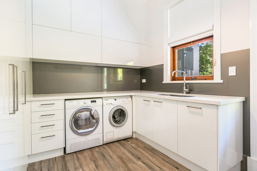Inspiration for a modern laundry room in Adelaide.