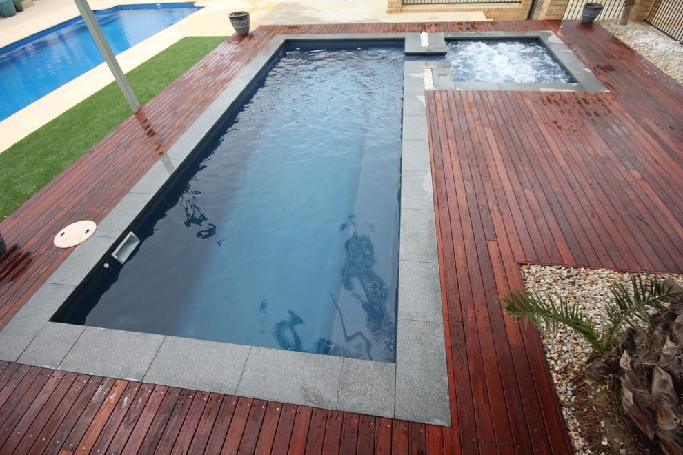 Mid-sized modern backyard rectangular pool in Perth.
