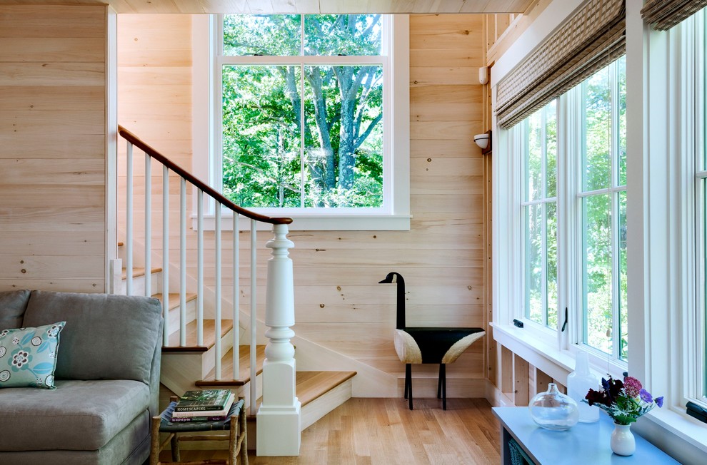 Design ideas for a beach style wood staircase in Portland Maine with wood risers.